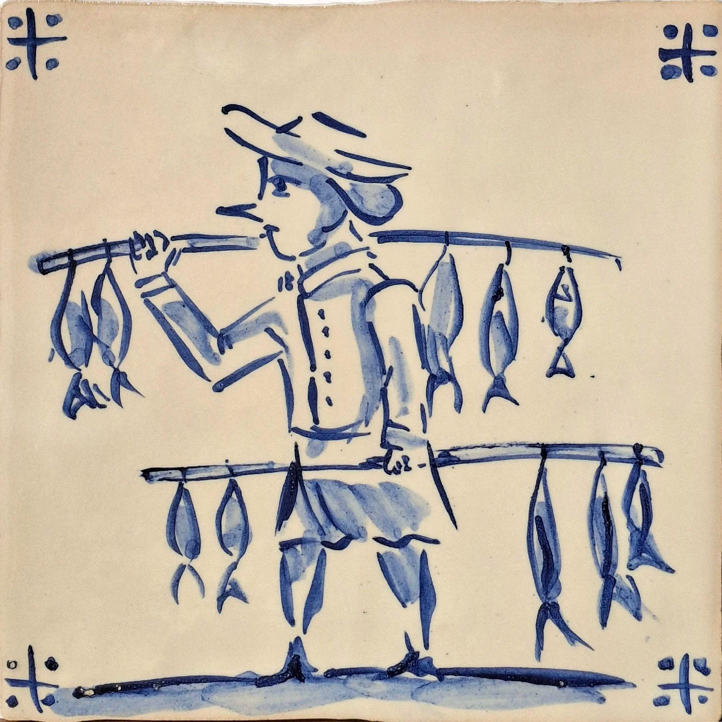 Fishmonger holding fish on a stick