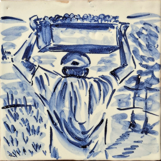Man with a box of potatoes