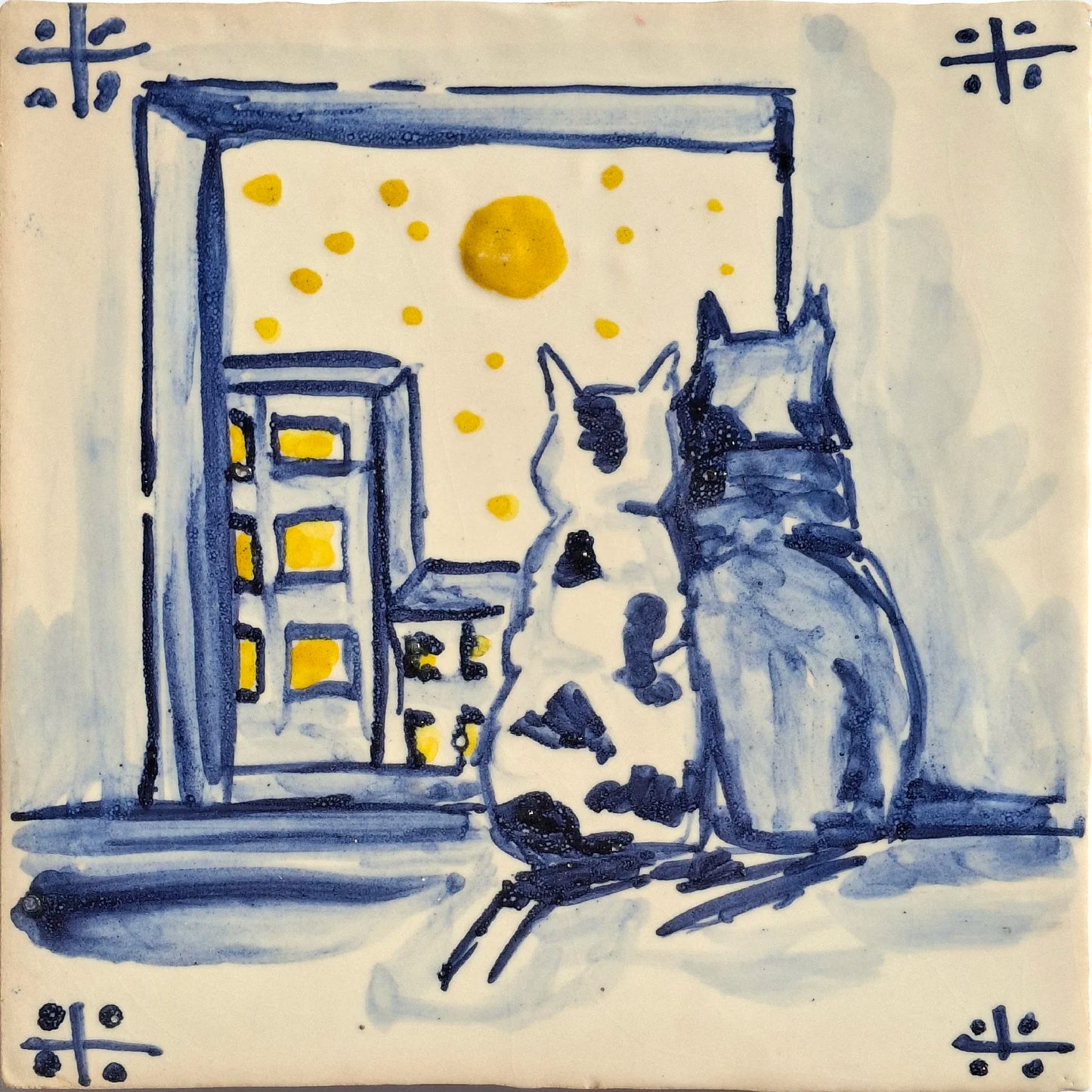  Two cats by a window with a moonlit sky