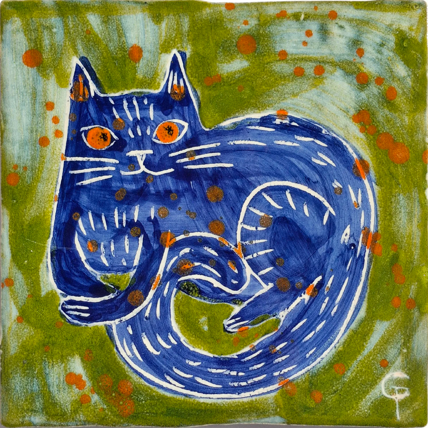 Blue cat on a green background with orange dots